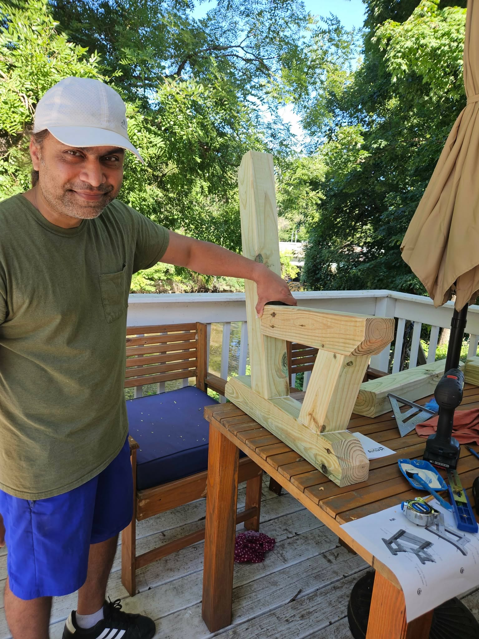 Holding up the first completed leg and side support assembly