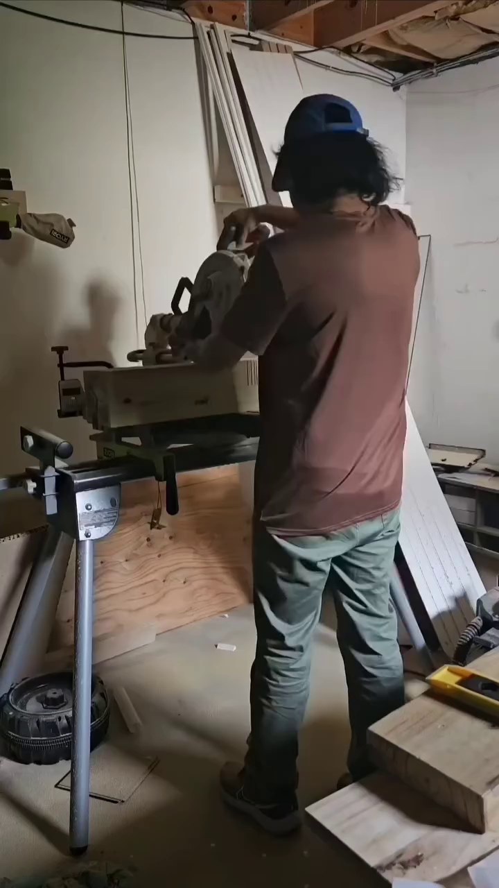 Cutting the lumber to length on the miter saw